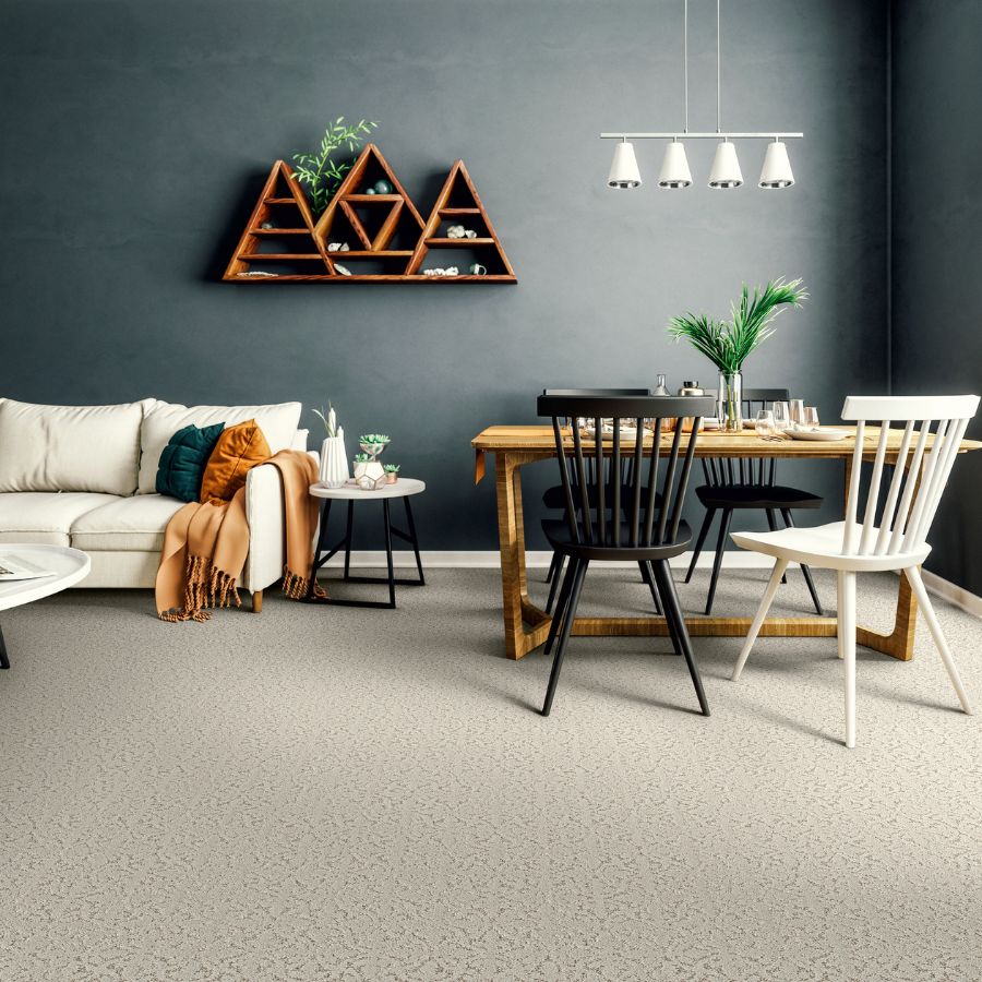 Carpet with wood table, white couch, chairs